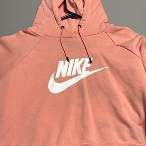 Peach colored Nike cropped sweatshirt